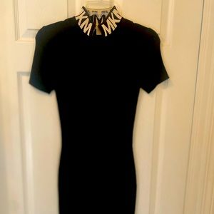 This is a mid length  MK logo  dress